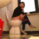 A short-haired brunette girl sits down on a toilet, lights a cigarette, and pisses. After taking a few drags on the cigarette and relaxing for some time, she wipes her front and her ass, even though no noticeable plops are heard. About 5 minutes.